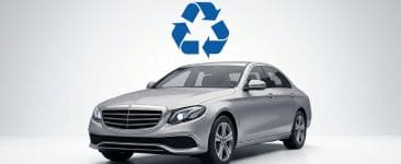 Samochód osobowy z symbolem recyklingu — leasing zwrotny